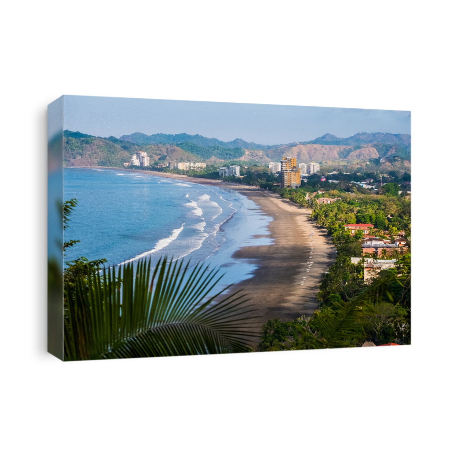 Tropical wide sandy beach of the town of Jaco, Costa Rica
